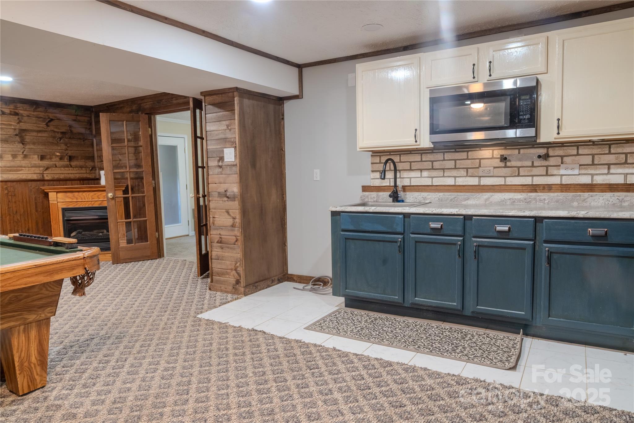 514 King Road Flat Rock, NC 28731 - Photo 44 of 47 a kitchen with stainless steel appliances granite countertop a sink and a stove