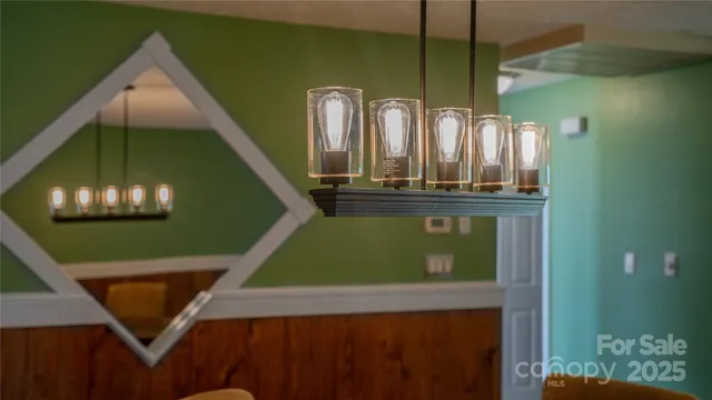 a view of a entryway door of the room