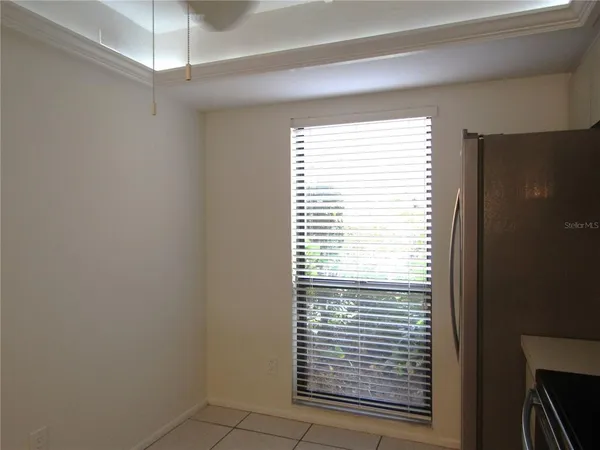 a view of a room that has a window in it