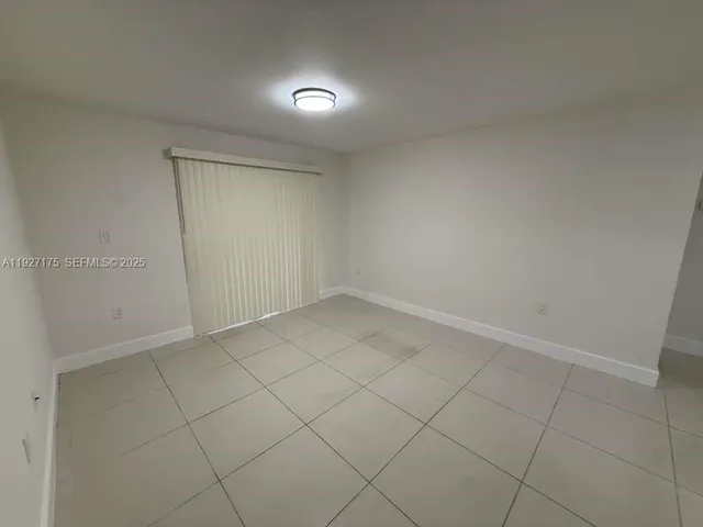 an empty room and a window