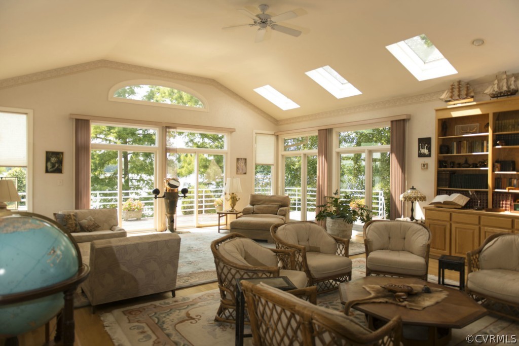 722 Point Anne Drive Hartfield, VA 23071 - Photo 14 of 21 a living room with furniture and a large window