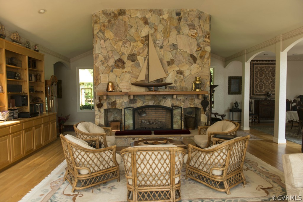 722 Point Anne Drive Hartfield, VA 23071 - Photo 15 of 21 a living room with furniture and a fireplace