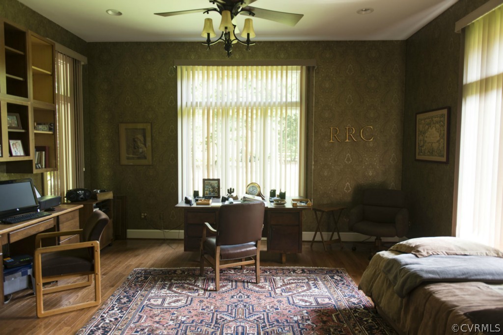 722 Point Anne Drive Hartfield, VA 23071 - Photo 20 of 21 a living room with furniture and a window