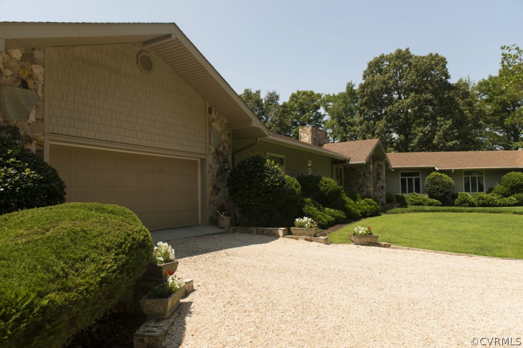 722 Point Anne Drive Hartfield, VA 23071 - Photo 4 of 21 a view of a house with a yard