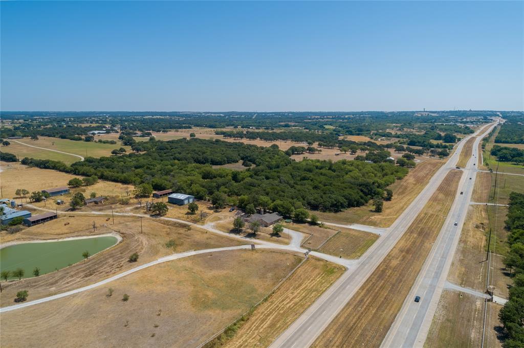 380 Decatur Tx 76234 Decatur, TX 76234 - Photo 7 of 30 a view of a terrace with wooden floor and a lake view