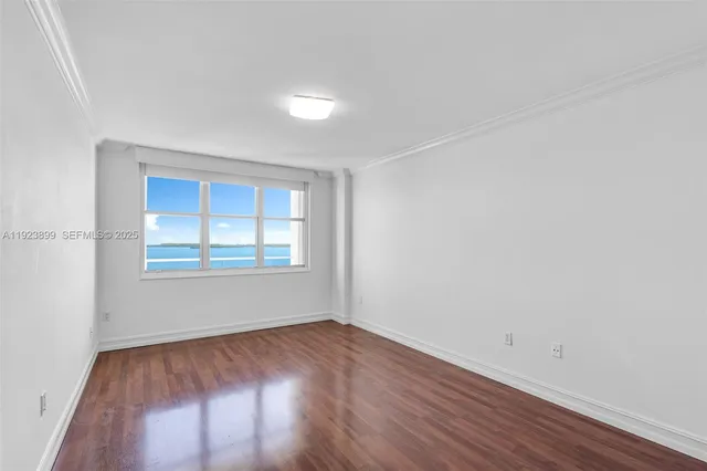 a kitchen with stainless steel appliances granite countertop a stove microwave and sink