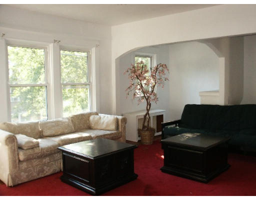 37-39 Beaconsfield Road Brookline, MA 02445 - Photo 2 of 2 a living room with furniture and a window