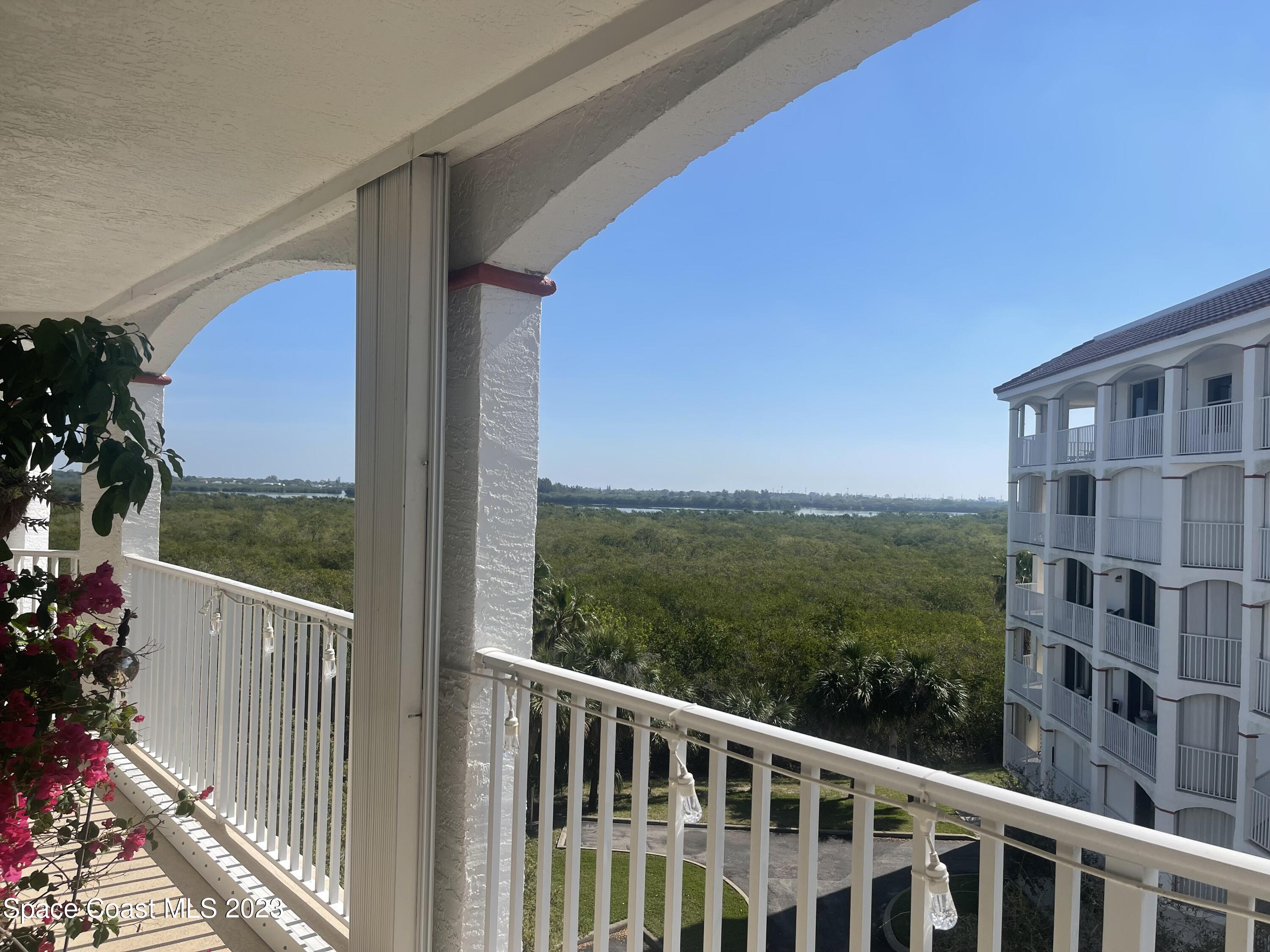 821 Del Rio Way, Unit 504 Merritt Island, FL 32953 - Photo 25 of 37 a view of a balcony with an outdoor space
