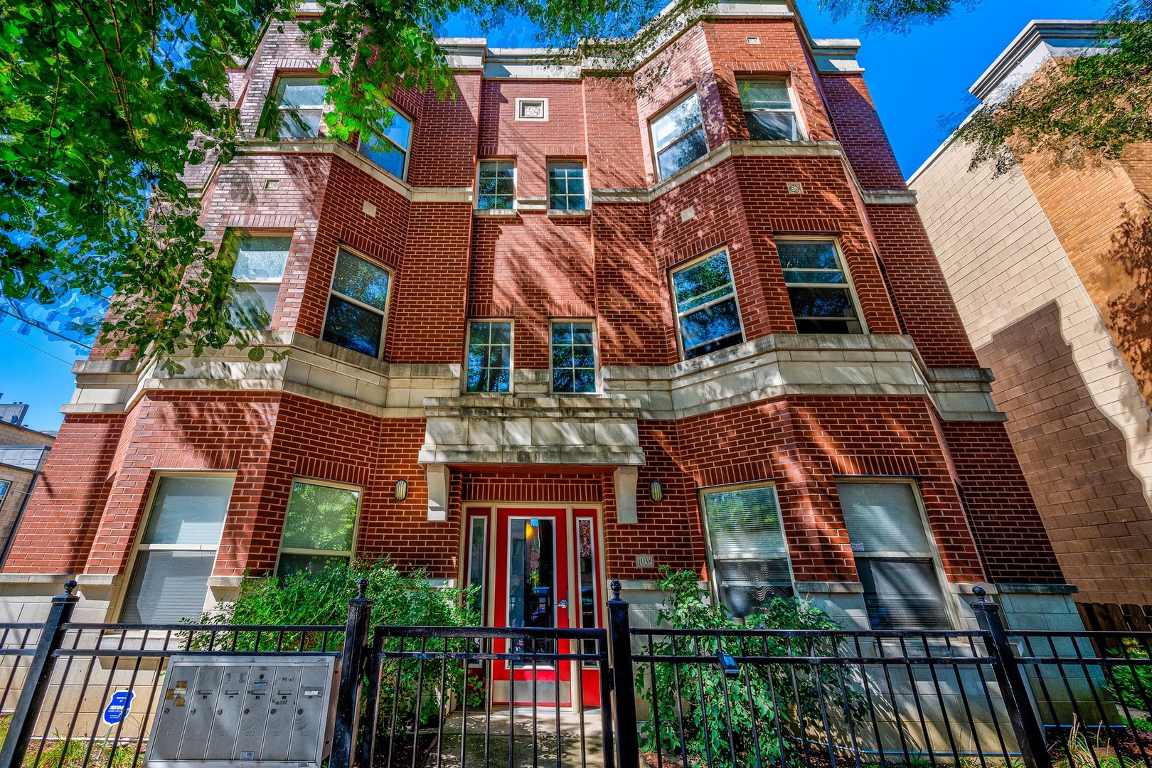 1038 South Racine Avenue, Unit 301 Chicago, IL 60607 - Photo 1 of 24 front view of a building