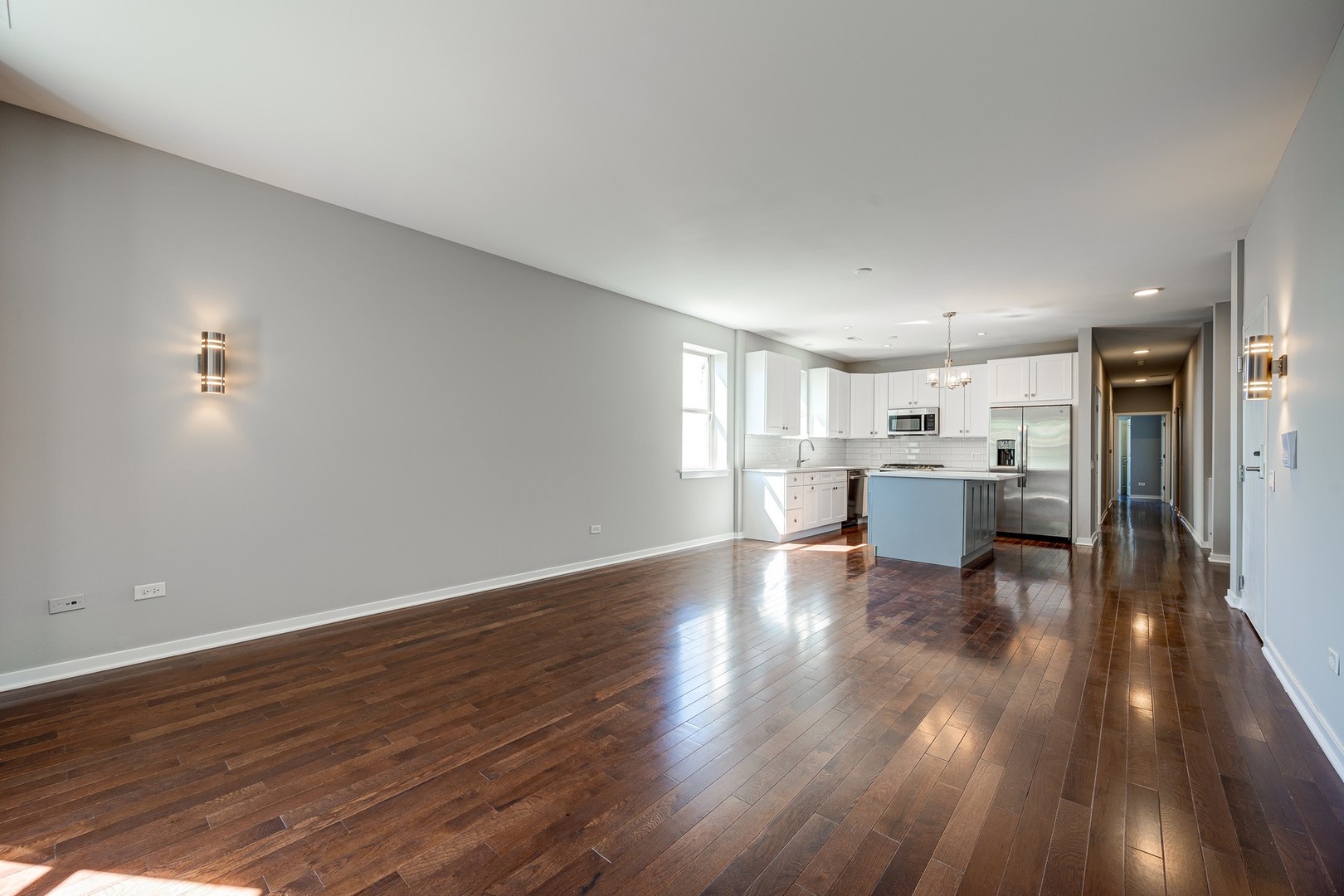 1038 South Racine Avenue, Unit 301 Chicago, IL 60607 - Photo 11 of 24 a view of kitchen with wooden floor and windows