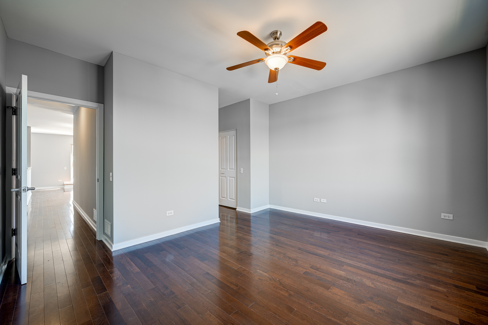 1038 South Racine Avenue, Unit 301 Chicago, IL 60607 - Photo 14 of 24 an empty room with wooden floor and window