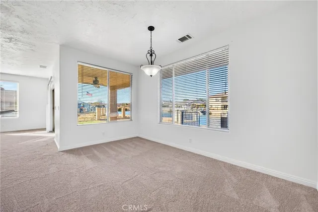 a kitchen with a sink a counter top space and appliances