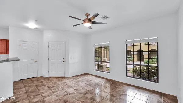 a view of a livingroom with a & window