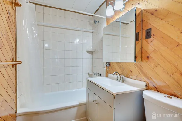 a bathroom with a sink and a bathtub