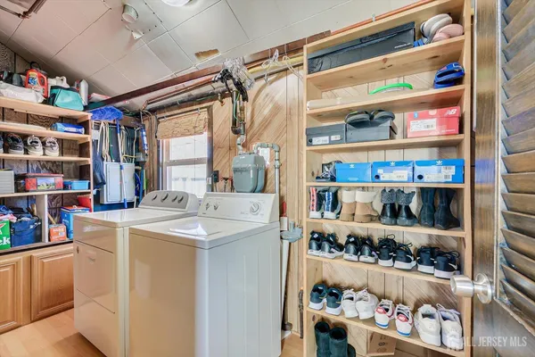 a utility room with washer and dryer