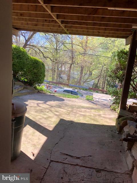 5221 Wyoming Road Bethesda, MD 20816 - Photo 20 of 24 VIEW FROM UNDER DECK FROM BASEMENT DOOR