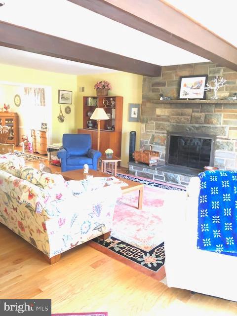 5221 Wyoming Road Bethesda, MD 20816 - Photo 9 of 24 LIVING ROOM WITH WONDERFUL STONE FIREPLACE