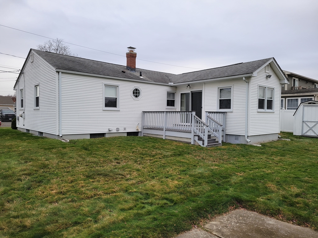 39 Daley Street Chicopee, MA 01013 - Photo 17 of 17 a house view with a backyard space