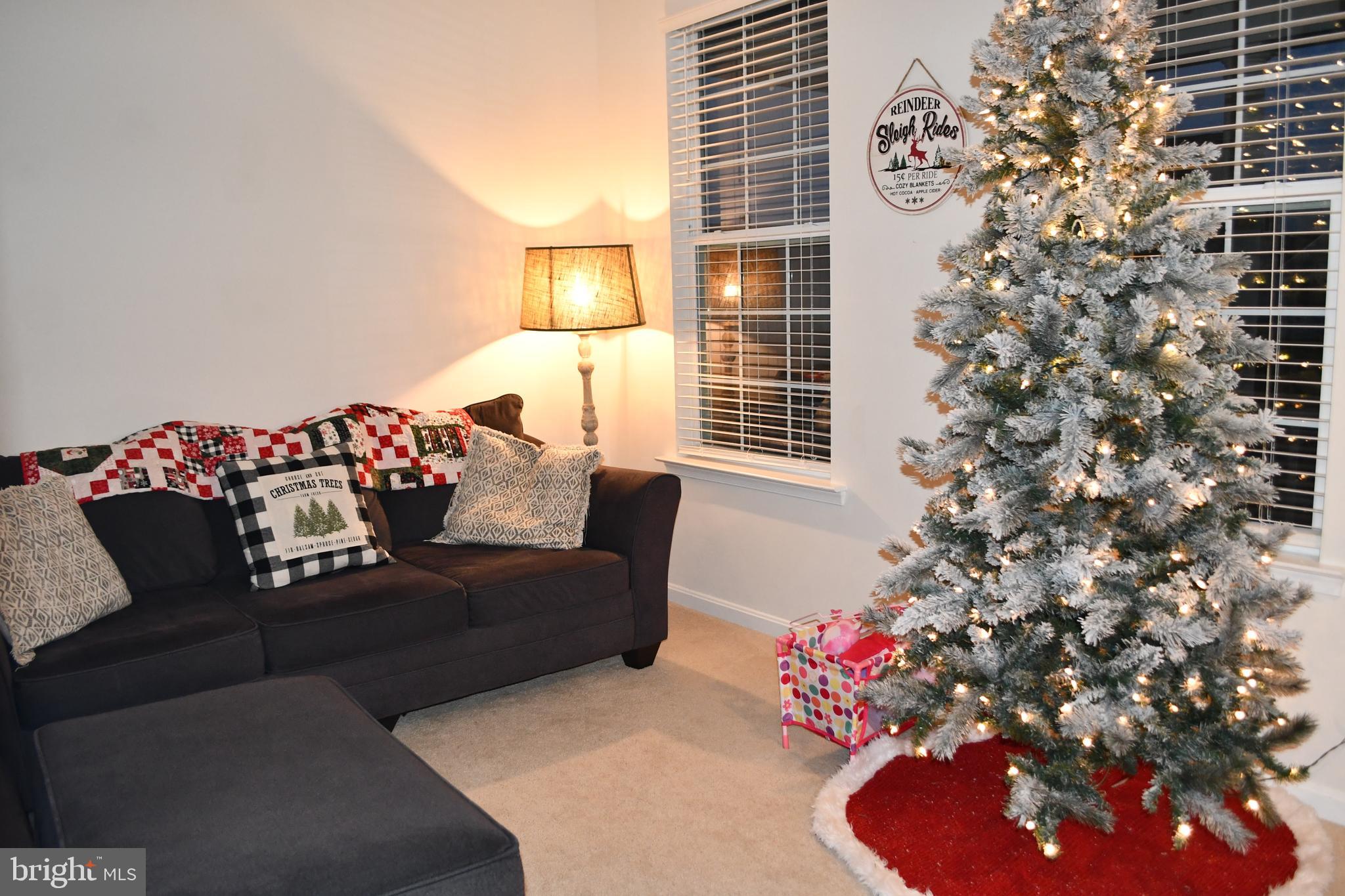 848 Chestnut Ridge Drive Magnolia, DE 19962 - Photo 13 of 38 a living room with furniture and a window