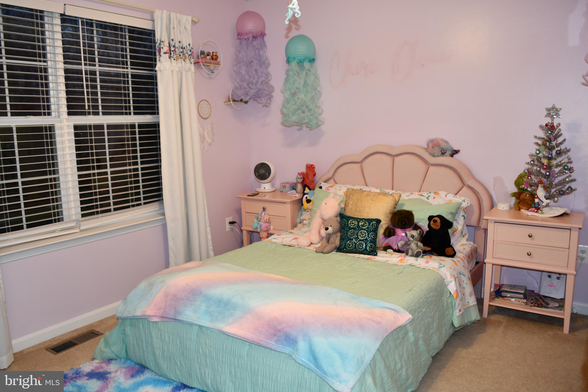 848 Chestnut Ridge Drive Magnolia, DE 19962 - Photo 22 of 38 a bedroom with a bed and a window