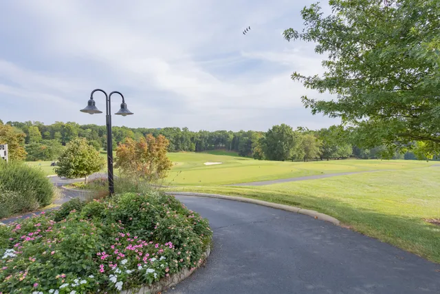 a view of a lake with a big yard