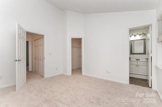 an empty room with a bathroom