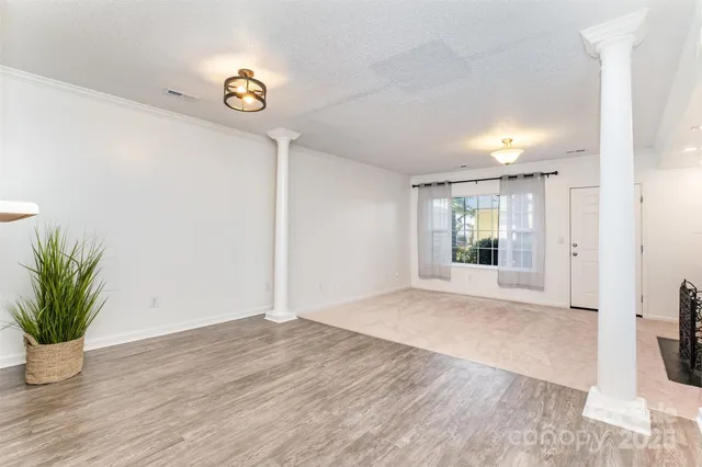 a view of an empty room and window