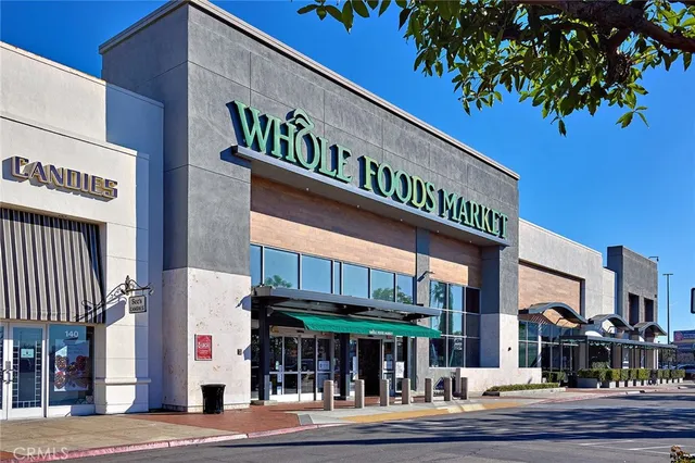 a view of a chairs and a table in the patio