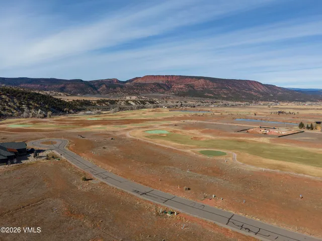 a view of an ocean and a mountain