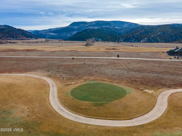 a view of ocean and mountain