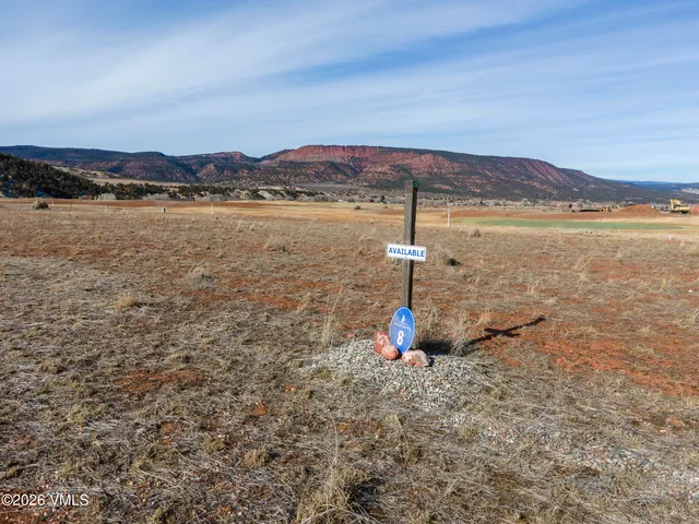 a view of a lake with a mountain