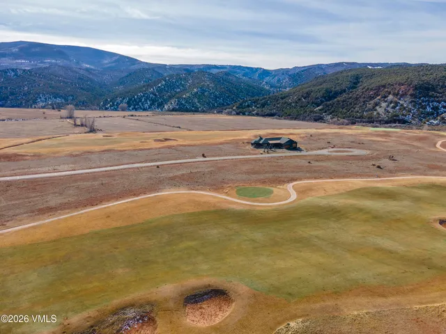 a view of an ocean and a mountain
