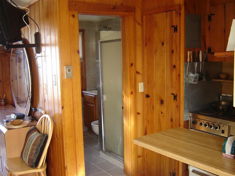 172 Captain Chase Road, Unit 3 Dennis Port, MA 02639 - Photo 3 of 10 a bathroom with a sink a toilet and shower
