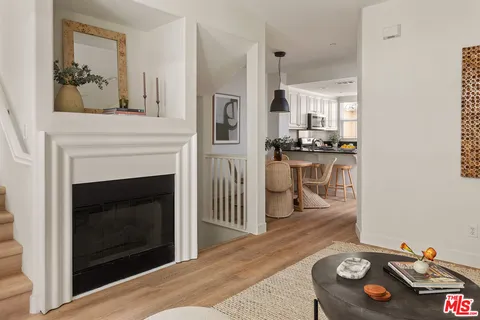 a kitchen with a sink a stove and refrigerator