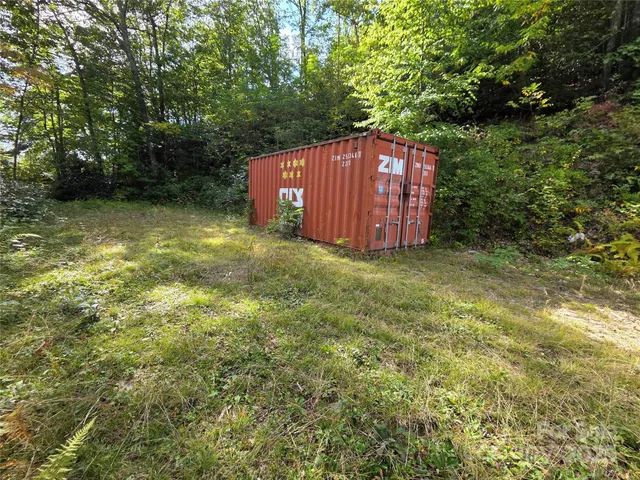 a view of a backyard of the house