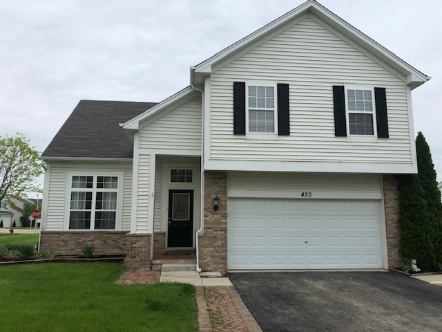 420 Kelly Court Romeoville, IL 60446 - Photo 2 of 30 a view of a white house
