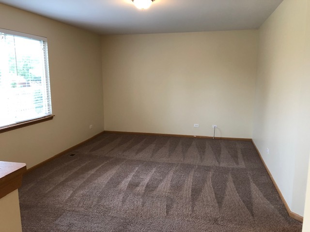 420 Kelly Court Romeoville, IL 60446 - Photo 12 of 30 an empty room with a window