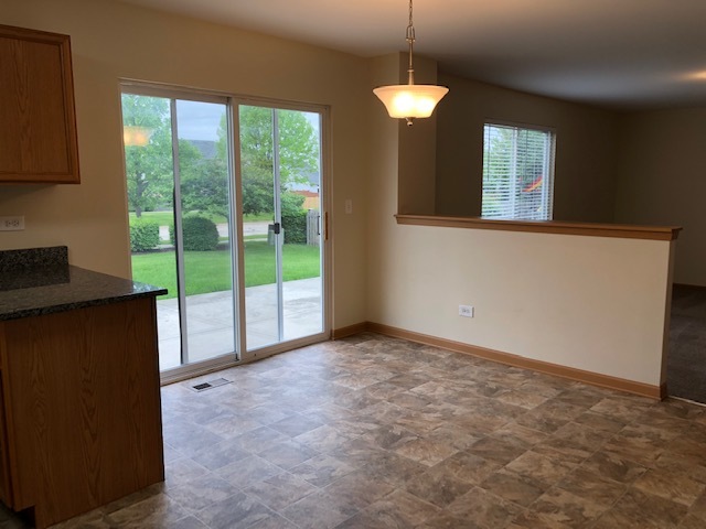 420 Kelly Court Romeoville, IL 60446 - Photo 13 of 30 a view of livingroom with window