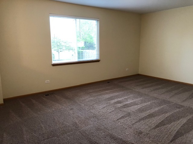 420 Kelly Court Romeoville, IL 60446 - Photo 23 of 30 an empty room with a window