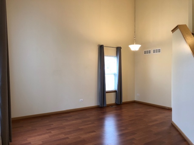 420 Kelly Court Romeoville, IL 60446 - Photo 10 of 30 a view of empty room with wooden floor
