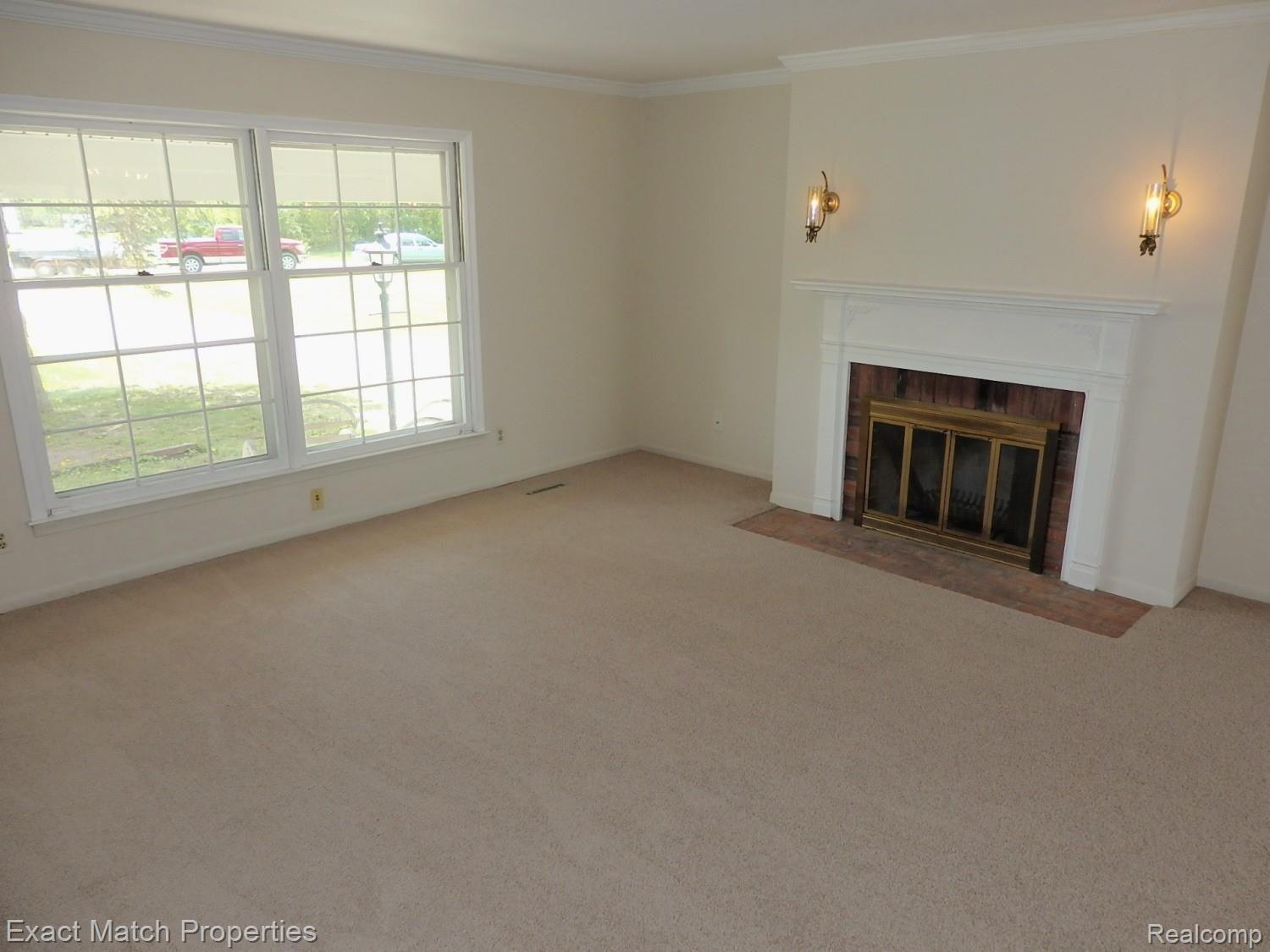 46130 Maben Road Canton, MI 48187 - Photo 20 of 43 Large windows brighten up the living room.