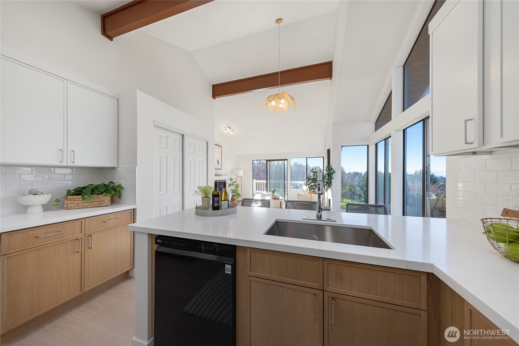 4727 155th Place Southeast Bellevue, WA 98006 - Photo 13 of 38 a kitchen with sink and cabinets