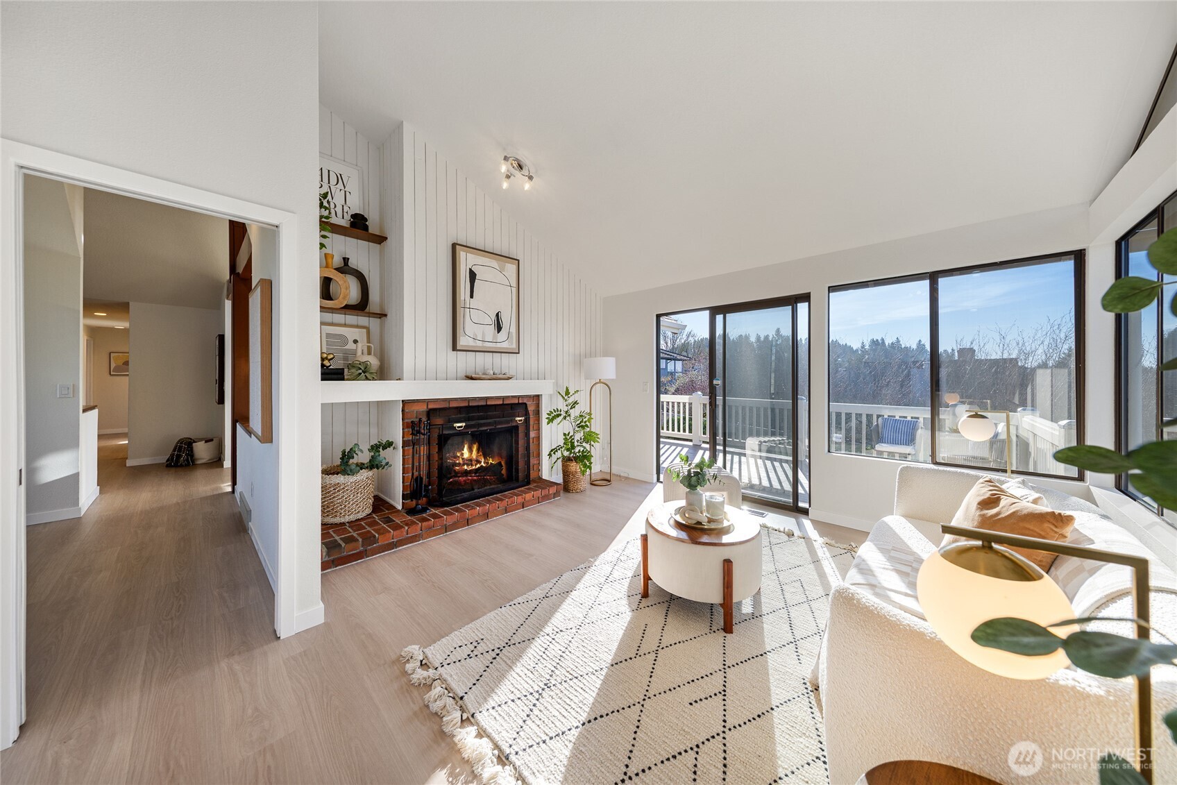 4727 155th Place Southeast Bellevue, WA 98006 - Photo 14 of 38 a living room with furniture and a fireplace