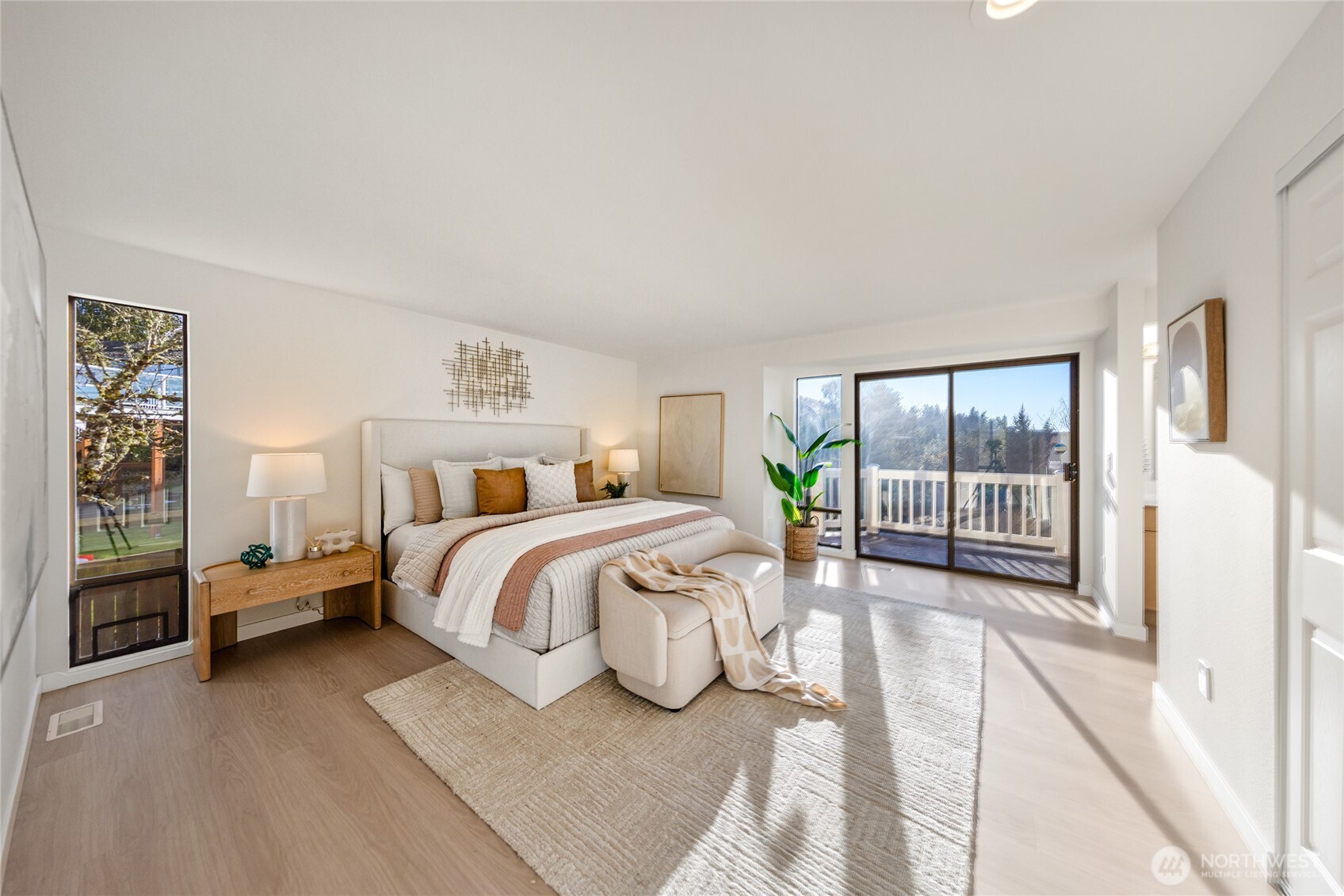 4727 155th Place Southeast Bellevue, WA 98006 - Photo 19 of 38 a bedroom with a large bed and a large window