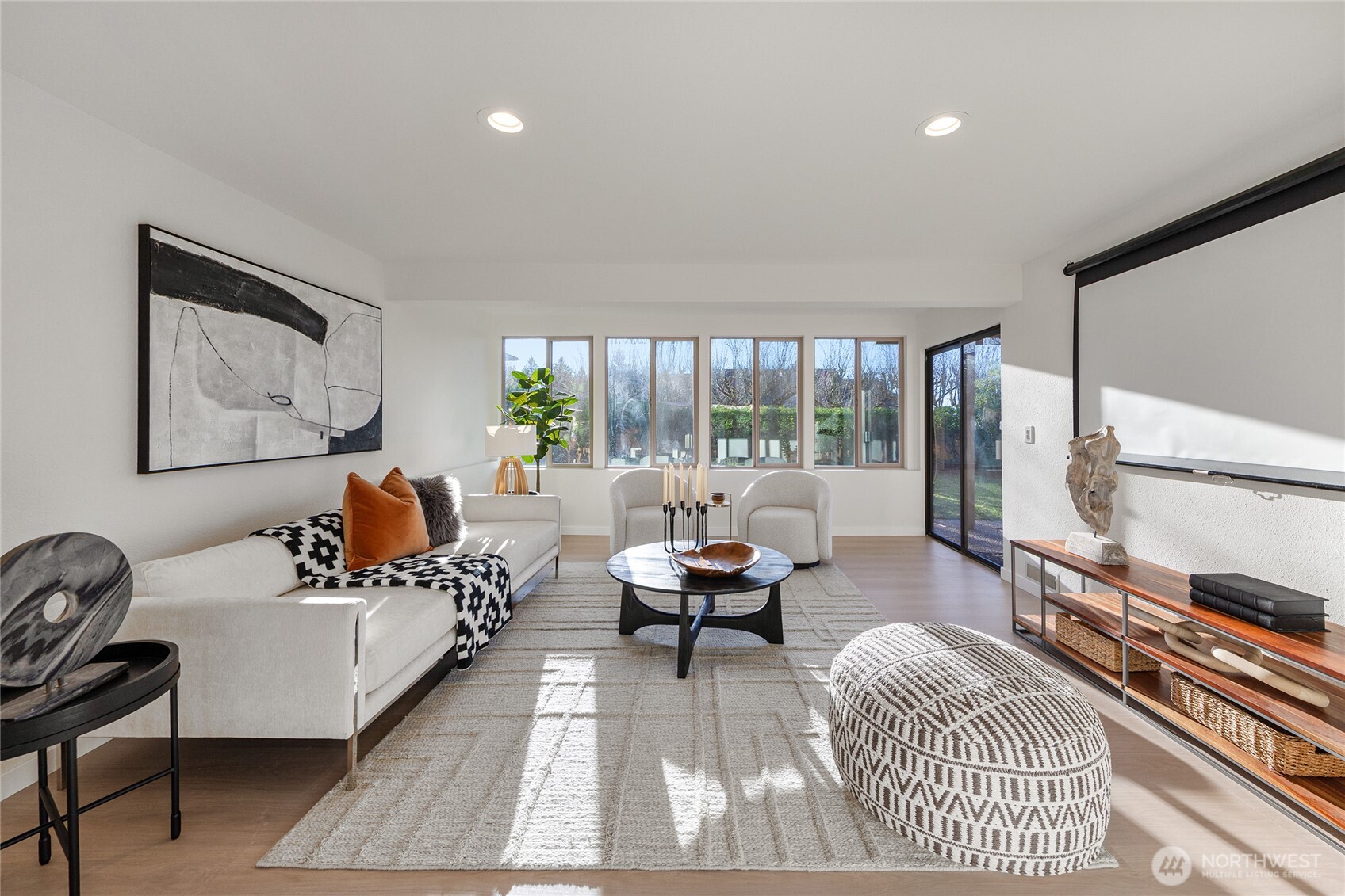 4727 155th Place Southeast Bellevue, WA 98006 - Photo 24 of 38 a living room with furniture fireplace and a large window