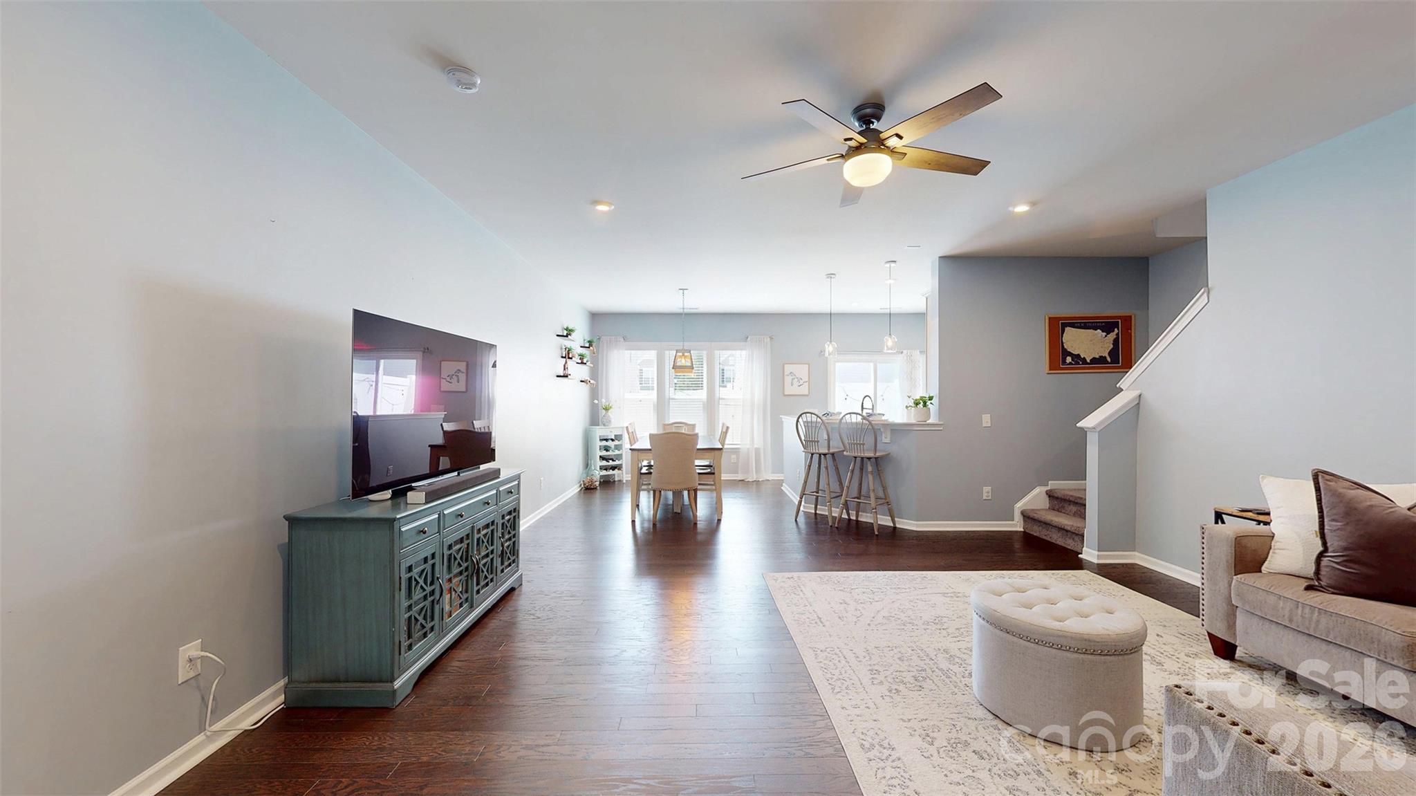 827 Canoe Song Road Fort Mill, SC 29708 - Photo 6 of 33 a living room with furniture and a flat screen tv