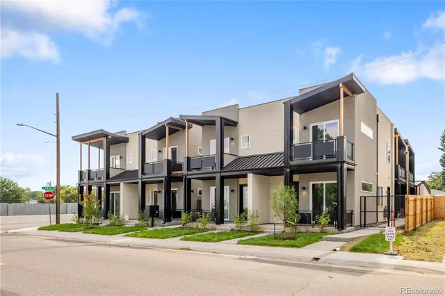 a view of a building with a yard