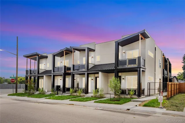 a front view of a building with street view