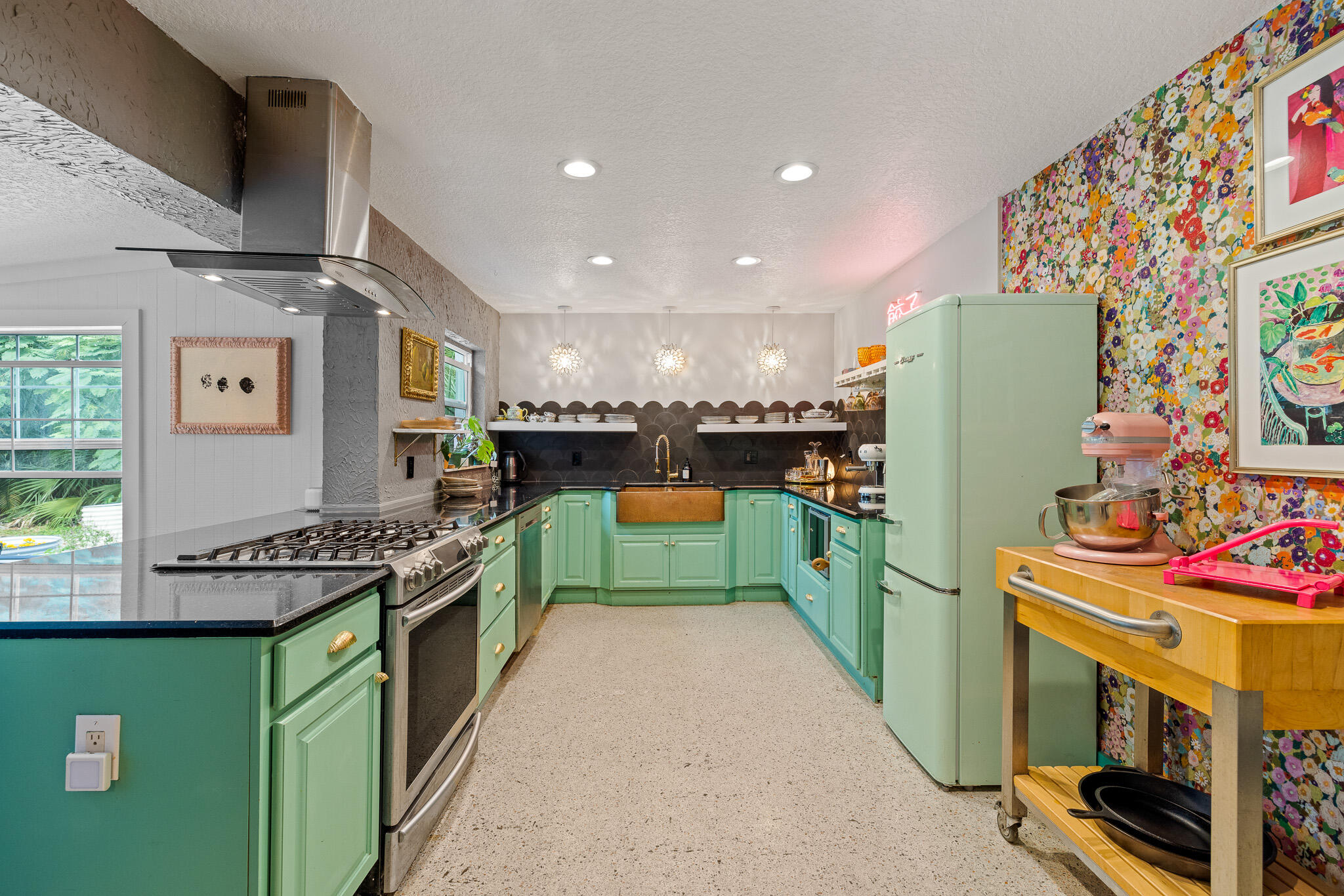 270 Richards Road Melbourne Beach, FL 32951 - Photo 23 of 41 a kitchen with a refrigerator and a stove top oven