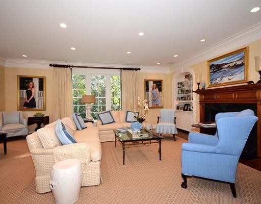 130 Long Neck Point Road Darien, CT 06820 - Photo 4 of 20 a living room with fireplace furniture and a large window